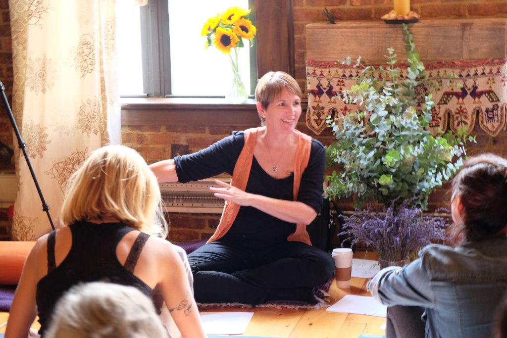 instructing a breathwork group