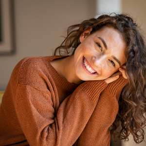woman smiling happily